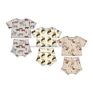 Vendita calda Set di abbigliamento per bambini con stampa modello stile occidentale personalizzato alla moda latte seta per bambini camicia a maniche corte e pantaloncini
