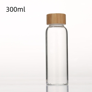 Vente en gros Bouteille d'<span class=keywords><strong>eau</strong></span> en verre portable ronde transparente en plein air de 300ml 420ml 500ml avec bouchon en acier inoxydable ou en bambou - Product Image 2