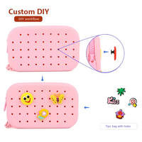 Petit porte-monnaie ovale en silicone à la mode nouveau sac cosmétique décoratif bricolage avec fermeture à glissière et trou décoratif