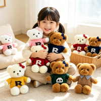 En gros Ours en peluche multicolore en forme de pull pour machine à griffes d'arcade, avec logo personnalisé