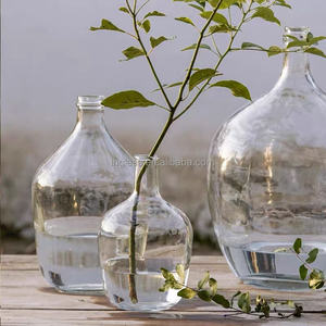 Meilleure vente en gros de décoration intérieure de style campagnard en bois osier support en rotin avec bouteille en verre Vase en cristal design tissé en <span class=keywords><strong>paille</strong></span> - Product Image 1