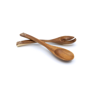 This 24.5 cm handmade acacia (Suar) wood spoon and fork set offers durable, food-safe quality with sustainable kitchen elegance. - Product Image 1