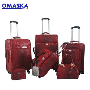 OMASKA गर्म बिक्री कारखाने उच्च गुणवत्ता लाल रंग पु चमड़े रोलिंग 4 पहियों 4 pcs सेट यात्रा सामान बैग मामलों - Product Image 2