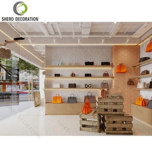 ตู้โชว์กระเป๋าแฟชั่น ตู้โชว์ร้านค้าสั่งทำพิเศษ ชั้นวางโชว์กระเป๋าผู้หญิงสำหรับร้านบูติก พร้อมไฟ LED เฟอร์นิเจอร์ร้านขายกระเป๋า - Product Image 1