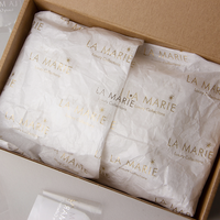 Papier d'emballage cadeau imprimé estampage or 17gsm personnalisé papier de soie personnalisé avec logo de marque pour l'emballage de vêtements/fleurs