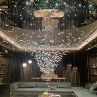 Lustre long en spirale papillon de conception italienne, décoration en cristal K9, luminaire de luxe en cristal pour villa duplex