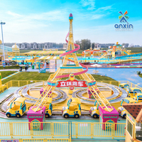 Petite montagnette tournante sur le thème de la Tour Eiffel, équipement de divertissement familial pour parcs d'attractions, pour enfants et adultes
