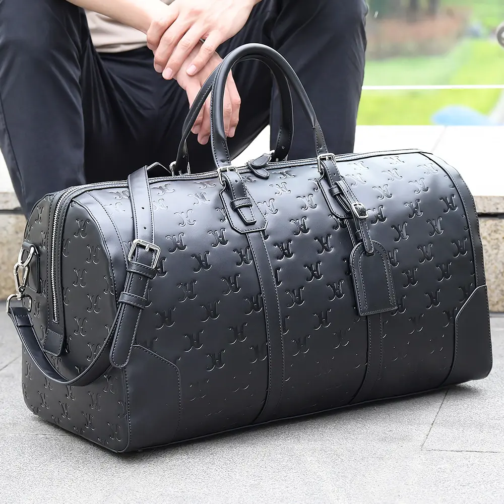 Haut de gamme luxe personnalisé plein gaufrage Logo hommes peau de vache noire véritable cuir véritable polochon sacs de voyage de nuit pour voyage