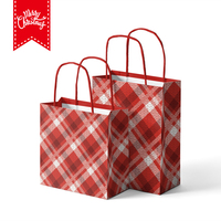 Bolsa de regalo de papel Kraft de Navidad personalizada con asa Embalaje personalizado de fábrica para fiestas Esquema de color rojo y blanco