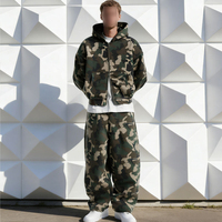 Ensemble deux pièces streetwear hiver homme : sweat à capuche et pantalon de survêtement camouflage surdimensionné avec fermeture éclair intégrale, personnalisable OEM