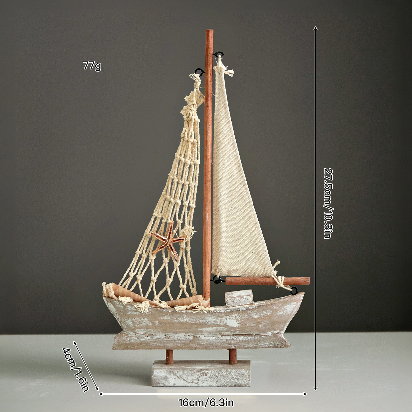 Small pine vintage-colored sailboat