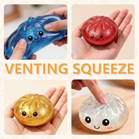 Jouet anti-stress en caoutchouc en forme de boulette vapeur avec effet miroir croisé, édition paillettes dorées, expression de dessin animé, à rebond lent et pour la décompression