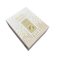 Boîte cadeau magnétique blanche de luxe avec estampage doré et insert en EVA