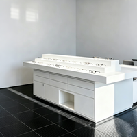 Vitrine optique blanche minimaliste,comptoir de vente au détail moderne avec tiroirs pour le stockage et l'affichage de lunettes