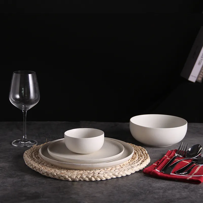 Service de vaisselle en porcelaine blanche, avec points noirs, glaçure, pierre médicale, ensemble de vaisselle de 4 9