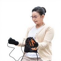 En stock – Vente en gros – Gant robot de rééducation portable pour l'entraînement des doigts, idéal pour les exercices post-AVC et hémiplégie