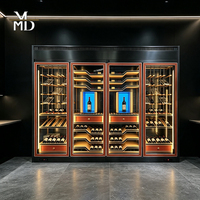 Armoire à vin de luxe en acier inoxydable avec cadre doré, cave à vin en verre personnalisable pour usage commercial