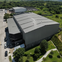 Entrepôt préfabriqué en structure métallique avec poutres en H haute résistance pour opérations industrielles – Bâtiment métallique préfabriqué