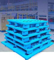Palette en plastique HDPE à 9 pattes, entrée 4 voies, 1200x1000x140mm, pour usage industriel, recyclable, pour stockage en entrepôt, logistique et transport