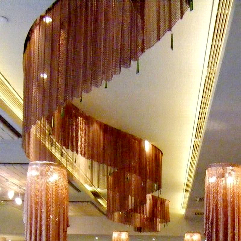 Decorative woven metal screens