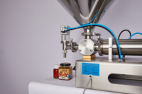 Machine de remplissage semi-automatique pour liquides épais, crème, pâte, sauce, miel, bouteilles