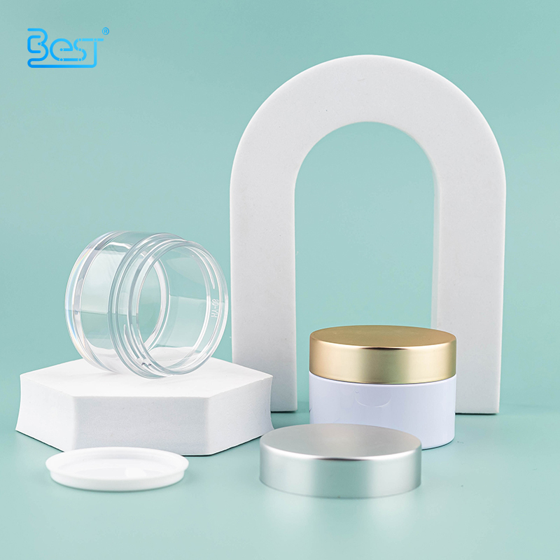 Pot en plastique avec couvercle en plastique plaqué or et argent.
