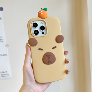 เคสโทรศัพท์ซิลิโคนลายการ์ตูนคาปิบาร่าสำหรับ iPhone 17 16 15 14 Pro max ลายคิตตี้โบว์น่ารัก ยางนิ่มสีส้มพีช ป้องกันการกระแทก - Product Image 1