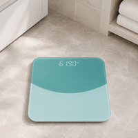 Balance de salle de bain numérique moderne vert turquoise en verre trempé avec affichage LED dissimulé pour pesée personnelle précise à domicile Pro