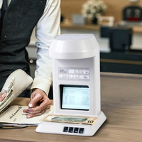 Testeur de billets de banque quadruple simultané Détecteur de faux billets IR Machine Détecteur d'argent UV/WM/IR /MG