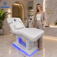 Table de massage électrique de luxe MOOLIN noire pour salon de beauté, spa facial, avec 4 moteurs et commande au pied, idéale pour les soins cosmétiques et des cils