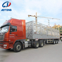 Remorque de camion type 3 essieux, deux compartiments, 50 têtes de bétail, remorque de camion avec clôture pour le transport de bétail/remorque de transport de bétail à vendre