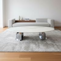 Table basse en pierre de luxe en cristal blanc avec une forme unique. Table basse en marbre pour salon de luxe et usage domestique.