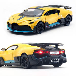 Nouvelle <span class=keywords><strong>voiture</strong></span> <span class=keywords><strong>de</strong></span> sport miniature DIVO en alliage 1:24 avec portes ouvrables, fonction <span class=keywords><strong>de</strong></span> recul et effets lumineux et sonores - Product Image 1