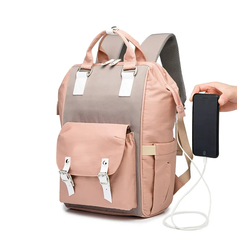حقيبة ظهر عصرية للأمهات مزودة بمخرج شحن USB لحمل حفاضات الأطفال والحقائب أثناء السفر للبيع بالجملة
