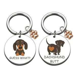 Porte-clés rond en acier inoxydable gravé au laser avec motif de chien de dessin animé Uionen, comme un petit cadeau pendentif - Product Image 1