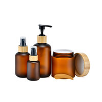Emballage de lotion cosmétique de luxe Bouteille à pompe en plastique PET pour gel douche shampooing avec bouchon en bambou 60ml 120ml 250ml 500ml