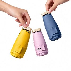 Mini parapluie portable manuel à ouverture plate pour femme, pliable en 6 sections, compact, avec revêtement UV noir - Product Image 1