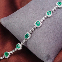 Parures de bijoux élégantes en or 10 carats avec pierres synthétiques, bracelet personnalisé en émeraude pour femmes, prix d'usine