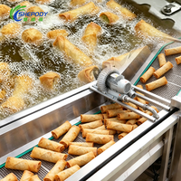 Chaîne de production de friteuses continues Shepody SUS 304 pour la fabrication de rouleaux de printemps, galettes de crevettes et empanadas frites à petite échelle