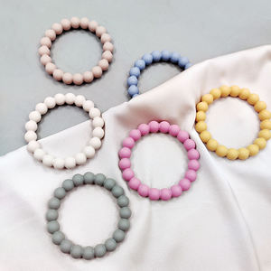Vente en gros de perles en silicone <span class=keywords><strong>anneau</strong></span> de <span class=keywords><strong>dentition</strong></span> avec poignée <span class=keywords><strong>anneau</strong></span> <span class=keywords><strong>molaire</strong></span> pour bébé <span class=keywords><strong>anneau</strong></span> de <span class=keywords><strong>dentition</strong></span> en silicone multicolore - Product Image 1
