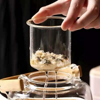 Vente en gros infuseur en verre à thé parfumé chinois théières bouilloires en verre avec manche en bambou