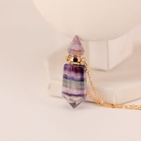 Haute qualité couleur naturelle luciole cristal pierre pointu hexagone colonne aromathérapie bouteille cristal collier hommes femmes