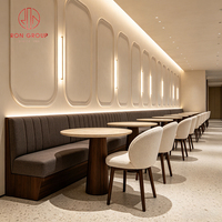 Meubles de restaurant Ron Group, table ronde en marbre, canapé gris foncé, banquette moderne, style luxe léger, café, chaise en tissu bouclé