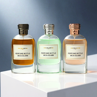 Vente en gros de flacons de parfum vides de 100 ml, rechargeables, étanches, avec un motif unique sur le bouchon, flacon en verre personnalisé avec boîte cadeau