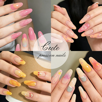 120 faux ongles à presser, boîte à 4 compartiments, forme amande moyenne, rose doux et jaune, motifs cerise, cœur et floral, pré-dessinés