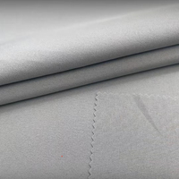 Tissu extensible 4 directions en polyester, fil flottant TPU 5K, 215 GSM, tissu tricoté imperméable et respirant à 3 fonctions pour veste et uniforme