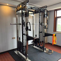 Máquina Smith multifuncional de acero con carga de placas, doble cable cruzado, para ejercicios de sentadillas, press de banca y entrenamiento de fuerza.