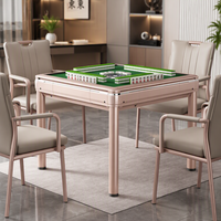 Nouvelle table de mahjong silencieuse dorée en stock, idéale pour le divertissement et les dîners en famille dans la salle d'échecs et de jeux de cartes