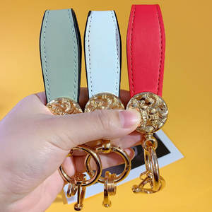 2024 Creativeปีใหม่จีนมังกรPU<span class=keywords><strong>หนัง</strong></span>พวงกุญแจกระเป๋าการ์ตูนรถจี้พวงกุญแจPU<span class=keywords><strong>หนัง</strong></span>พวงกุญแจอุปกรณ์เสริม - Product Image 2