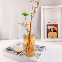 Bouteilles de diffuseur d'aromathérapie en verre rechargeables rondes transparentes de 150ml avec décoration de couvercle noir